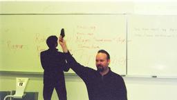 108 - Emil tried to write stuff on the board. Failed miserably. Robert held up a sock someone threw at him.
