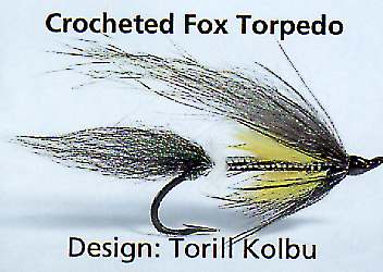 A large Crocheted Fox Torpedo
